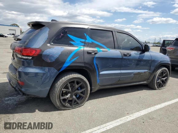2020 Jeep Grand Cherokee Trackhawk z VIN 1C4RJFN94LC314087, wystawiony jako Copart lot #51484835 z przebiegiem 38 306 mil mil oraz Szkoda całkowita • Salvage title. Historia ofert i sprzedaży dostępna na DreamBid. Obrazek 3.