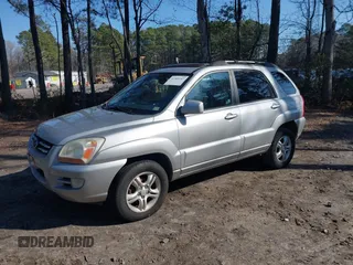 2005 Kia Sportage LX with VIN KNDJF723057130569, listed as a IAAI auction lot 41509247 with 155,777 mi miles and . Bid and sale history available at carsss.com. Image 2.