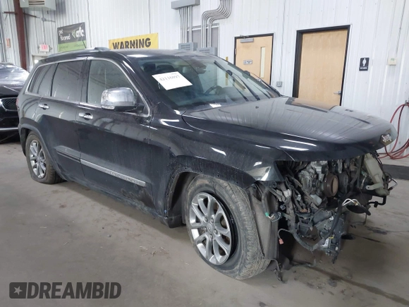 2013 Jeep Grand Cherokee Overland with VIN 1C4RJFCT7DC524005, listed as a IAAI auction lot 42116097 with 126,942 mi miles. Bid and sale history available at carsss.com. Image 1.