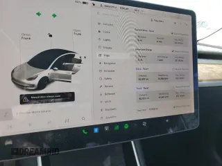 2020 Tesla Model 3 Standard Range Plus with VIN 5YJ3E1EA4LF799597, listed as a Copart auction lot 76401374 with 77,506 mi miles and Salvage Title. Bid and sale history available at DreamBid. Image 9.