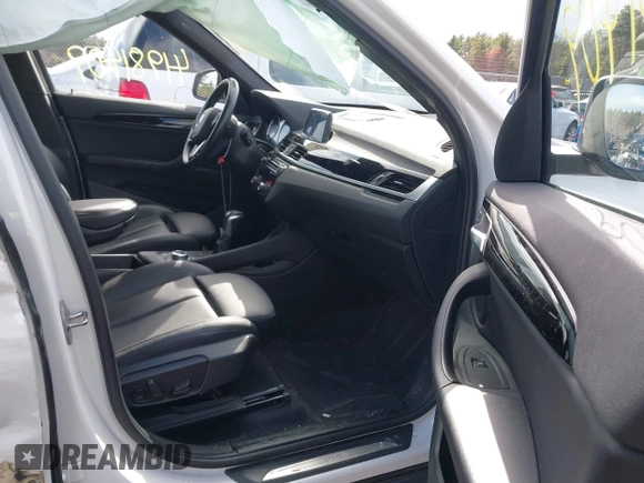 2019 BMW X1 xDrive28i with VIN WBXHT3C56K5L35842, listed as a IAAI auction lot 41981409 with 54,325 mi miles. Bid and sale history available at carsss.com. Image 5.