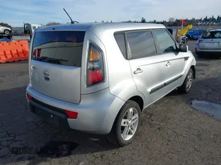 2011 Kia Soul + with VIN KNDJT2A22B7266928, listed as a IAAI auction lot 41572553 with 155,214 mi miles. Bid and sale history available at carsss.com. Image 4.