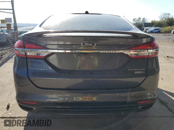 2018 Ford Fusion Titanium с VIN 3FA6P0D92JR192382, выставлен на аукционе Copart как лот 74065774 с пробегом 110 411 миль миль и Списание • Salvage title. История ставок и продаж доступна на DreamBid. Изображение 6.