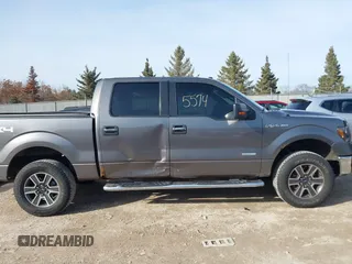 2011 Ford F-150 XLT with VIN 1FTFW1ET7BFC47792, listed as a IAAI auction lot 41765574 with 174,001 mi miles. Bid and sale history available at carsss.com. Image 13.