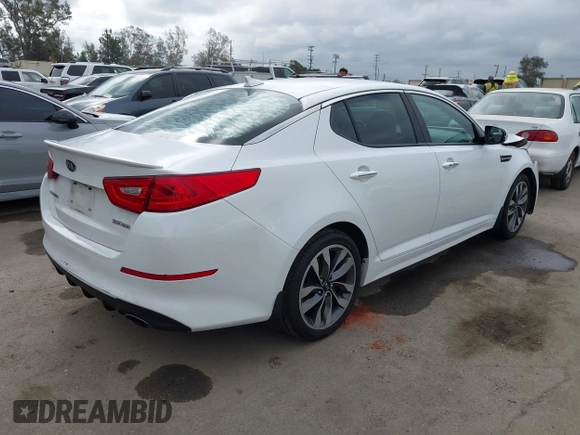 2015 Kia Optima SX with VIN 5XXGR4A70FG490244, listed as a IAAI auction lot 42076958 with 140,820 mi miles and . Bid and sale history available at DreamBid. Image 4.