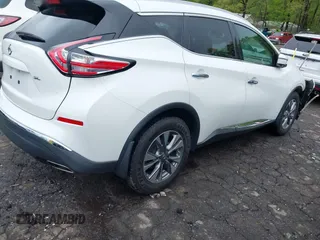 2016 Nissan Murano Platinum with VIN 5N1AZ2MG5GN126361, listed as a IAAI auction lot 41973077 with 124,624 mi miles and . Bid and sale history available at DreamBid. Image 4.