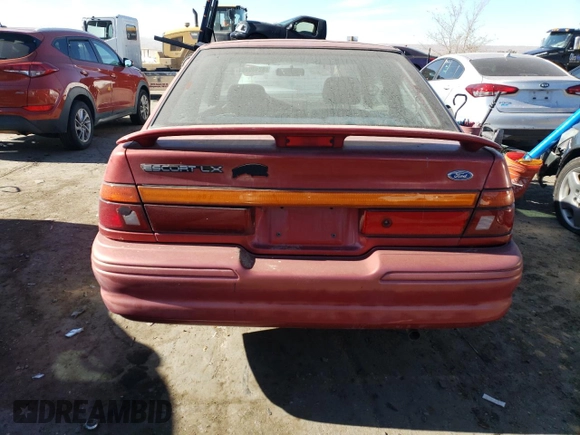 1996 Ford Escort z VIN 1FASP11J0TW138176, wystawiony jako Copart lot #82435494 z przebiegiem 62 107 mil mil oraz Czysty tytuł • Clean title. Historia ofert i sprzedaży dostępna na DreamBid. Obrazek 6.