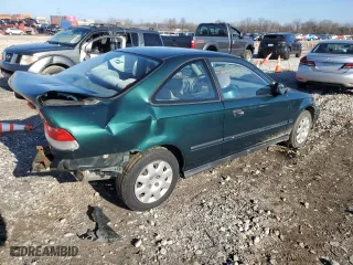 1999 Honda Civic DX with VIN 1HGEJ6229XL059370, listed as a Copart auction lot 86698214 with 0 mi miles and Salvage Title. Bid and sale history available at carsss.com. Image 3.
