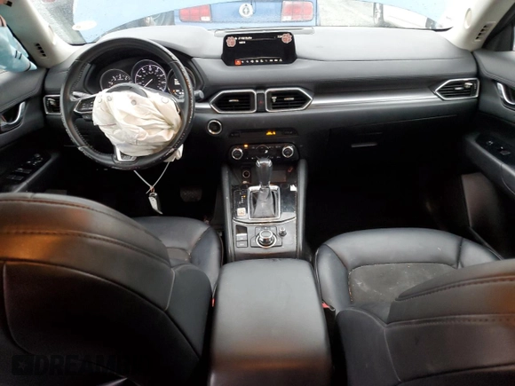 2017 Mazda CX-5 Touring with VIN JM3KFBCLXH0124451, listed as a Copart auction lot 51060275 with 126,807 mi miles and Salvage Title. Bid and sale history available at carsss.com. Image 8.