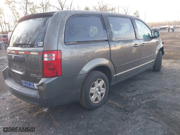 2010 Dodge Grand Caravan SE with VIN 2D4RN4DE7AR397092, listed as a IAAI auction lot 41084684 with 117,747 mi miles. Bid and sale history available at carsss.com. Image 4.