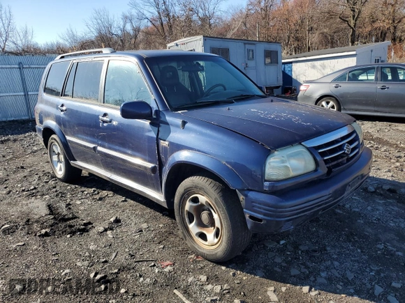 2002 Suzuki XL7 Standard with VIN JS3TX92VX24117328, listed as a Copart auction lot 49181005 with 80,458 mi miles and Salvage title. Bid and sale history available at DreamBid. Image 4.