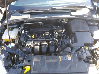 2015 Ford Focus SE with VIN 1FADP3F21FL262033, listed as a IAAI auction lot 41521714 with 101,890 mi miles. Bid and sale history available at carsss.com. Image 10.