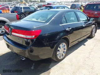 2011 Lincoln MKZ with VIN 3LNHL2GC2BR769295, listed as a IAAI auction lot 41977083 with 103,037 mi miles. Bid and sale history available at carsss.com. Image 4.