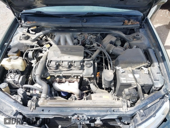 1999 Toyota Solara SE with VIN 2T1CF22PXXC247611, listed as a IAAI auction lot 41863240 with 153,823 mi miles. Bid and sale history available at carsss.com. Image 10.