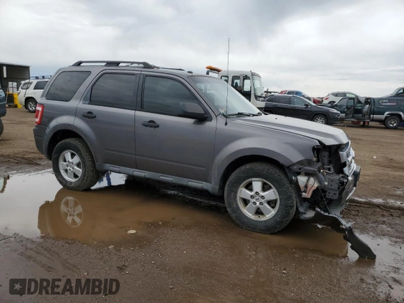 2012 Ford Escape XLT with VIN 1FMCU9DG6CKB43438, listed as a Copart auction lot 58499905 with 179,911 mi miles and Salvage title. Bid and sale history available at DreamBid. Image 4.