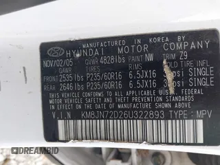 2006 Hyundai Tucson GLS with VIN KM8JN72D26U322893, listed as a IAAI auction lot 41882842 with 116,972 mi miles. Bid and sale history available at carsss.com. Image 9.