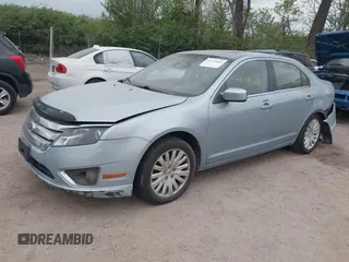 2010 Ford Fusion Hybrid z VIN 3FADP0L36AR200035, wystawiony jako IAAI lot #42145684 z przebiegiem 142 137 mil mil oraz . Historia ofert i sprzedaży dostępna na DreamBid. Obrazek 2.