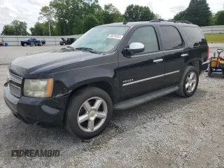 2010 Chevrolet Tahoe LTZ with VIN 1GNUKCE01AR101686, listed as a Copart auction lot 54679355 with 204,098 mi miles and Salvage title. Bid and sale history available at DreamBid. Image 1.