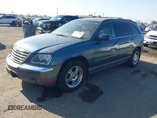 2005 Chrysler Pacifica Touring with VIN 2C4GM68445R651173, listed as a IAAI auction lot 41447054 with 294,074 mi miles and . Bid and sale history available at DreamBid. Image 2.