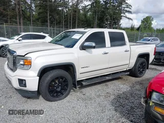 2014 GMC Sierra 1500 Denali z VIN 3GTU2WEJXEG527496, wystawiony jako IAAI lot #42211521 z przebiegiem 151 974 mil mil oraz . Historia ofert i sprzedaży dostępna na DreamBid. Obrazek 14.