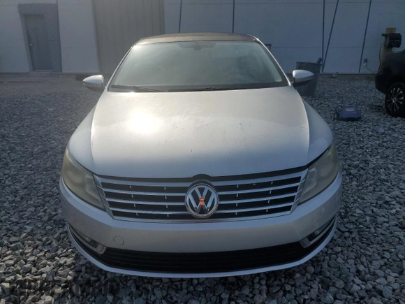 2013 Volkswagen CC Lux z VIN WVWHU7AN3DE500737, wystawiony jako Copart lot #56109175 z przebiegiem 135 579 mil mil oraz Tytuł czysty. Historia ofert i sprzedaży dostępna na DreamBid. Obrazek 5.