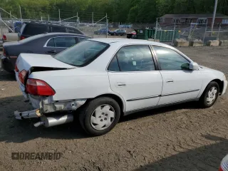 2000 Honda Accord LX z VIN 1HGCG1642YA080255, wystawiony jako Copart lot #53636855 z przebiegiem 146 478 mil mil oraz Szkoda całkowita • Salvage title. Historia ofert i sprzedaży dostępna na DreamBid. Obrazek 3.