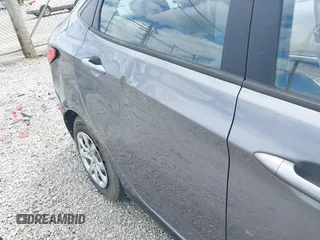 2014 Hyundai Accent GLS with VIN KMHCT4AE6EU670895, listed as a IAAI auction lot 42197066 with 142,983 mi miles and . Bid and sale history available at carsss.com. Image 12.