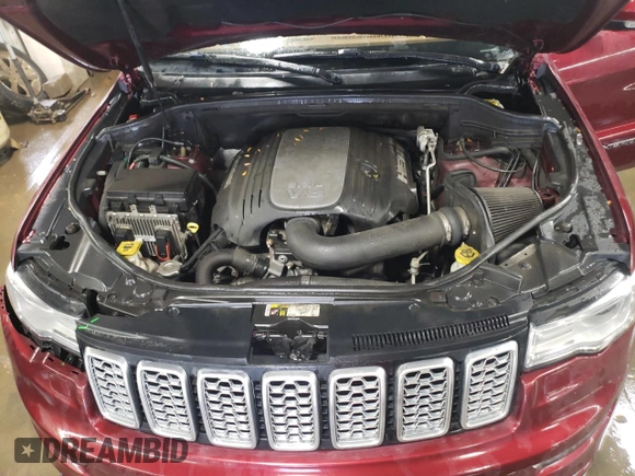 2018 Jeep Grand Cherokee Summit z VIN 1C4RJFJT7JC398744, wystawiony jako Copart lot #88267195 z przebiegiem 110 041 mil mil oraz Szkoda całkowita • Salvage title. Historia ofert i sprzedaży dostępna na DreamBid. Obrazek 11.