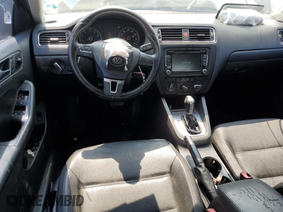 2012 Volkswagen Jetta SE with VIN 3VWDX7AJ9CM417564, listed as a Copart auction lot 77314634 with 235,196 mi miles and Salvage title. Bid and sale history available at DreamBid. Image 8.