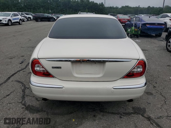 2007 Jaguar XJ with VIN SAJWA71B67SH12726, listed as a Copart auction lot 64840394 with 71,363 mi miles and Salvage Title. Bid and sale history available at carsss.com. Image 6.