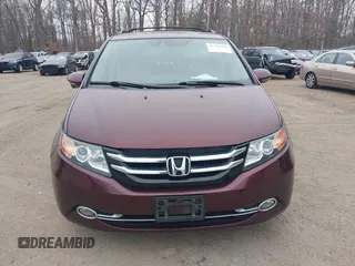 2014 Honda Odyssey Touring with VIN 5FNRL5H97EB117971, listed as a IAAI auction lot 41794324 with 198,191 mi miles and . Bid and sale history available at DreamBid. Image 12.