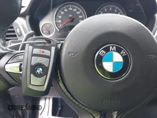 2019 BMW M4 with VIN WBS4Y9C53KAH82910, listed as a IAAI auction lot 41570315 with 59,227 mi miles. Bid and sale history available at carsss.com. Image 11.