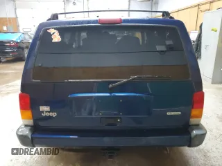 2000 Jeep Cherokee z VIN 1J4FF48S0YL153259, wystawiony jako Copart lot #52509955 z przebiegiem 204 042 mil mil oraz Czysty tytuł • Clean title. Historia ofert i sprzedaży dostępna na DreamBid. Obrazek 6.