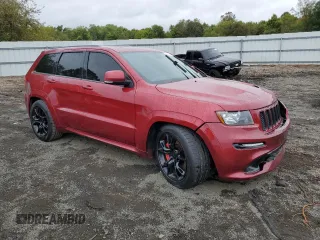 2012 Jeep Grand Cherokee SRT8 with VIN 1C4RJFDJ0CC351195, listed as a Copart auction lot 72794454 with 104,672 mi miles and Salvage Title. Bid and sale history available at carsss.com. Image 4.