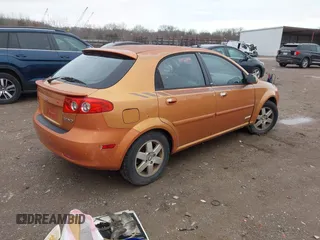 2005 Suzuki Reno z VIN KL5JJ66Z85K160610, wystawiony jako IAAI lot #41526883 z przebiegiem Nie podano mil oraz . Historia ofert i sprzedaży dostępna na DreamBid. Obrazek 4.