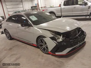 2023 Hyundai Elantra N with VIN KMHLW4AKXPU018877, listed as a IAAI auction lot 41459852 with 14,135 mi miles. Bid and sale history available at carsss.com. Image 1.