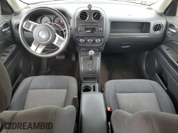 2015 Jeep Patriot Latitude with VIN 1C4NJRFB8FD366581, listed as a Copart auction lot 56221585 with 171,009 mi miles and Salvage title. Bid and sale history available at DreamBid. Image 8.