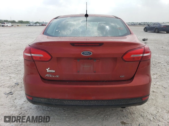 2018 Ford Focus SE z VIN 1FADP3F21JL269539, wystawiony jako Copart lot #51655945 z przebiegiem 88 133 mil mil oraz Szkoda całkowita • Salvage title. Historia ofert i sprzedaży dostępna na DreamBid. Obrazek 6.