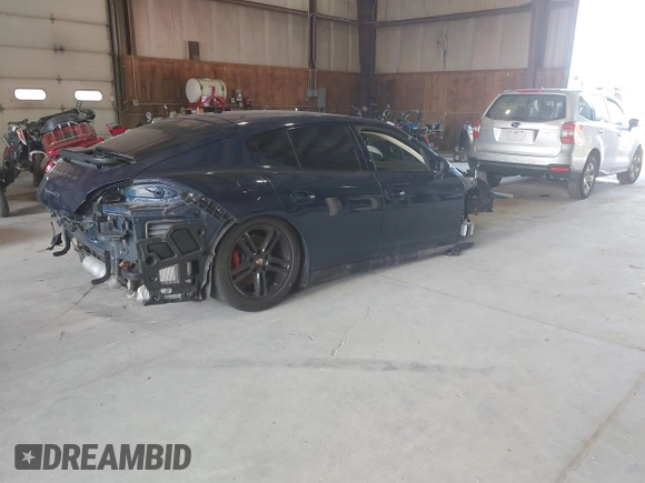 2014 Porsche Panamera GTS with VIN WP0AF2A7XEL083274, listed as a IAAI auction lot 40258451 with 98,861 mi miles and . Bid and sale history available at DreamBid. Image 4.