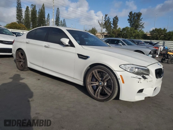 2013 BMW M5 with VIN WBSFV9C56DD096389, listed as a Copart auction lot 44951815 with 123,256 mi miles and Salvage Title. Bid and sale history available at carsss.com. Image 4.