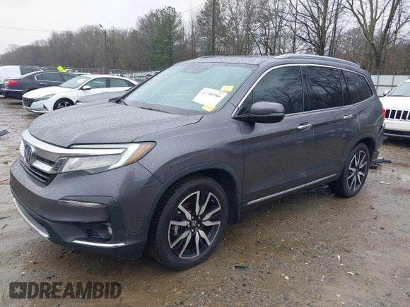 2021 Honda Pilot Touring 8-Passenger with VIN 5FNYF5H9XMB014190, listed as a IAAI auction lot 41749586 with 67,602 mi miles and . Bid and sale history available at DreamBid. Image 18.