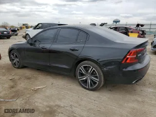 2020 Volvo S60 R-Design with VIN 7JRA22TM6LG038242, listed as a Copart auction lot 77043984 with 103,382 mi miles and Salvage Title. Bid and sale history available at carsss.com. Image 2.