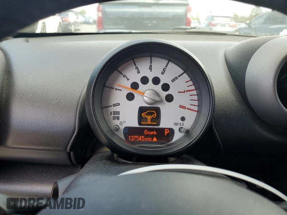2011 MINI Countryman S with VIN WMWZC5C5XBWL55516, listed as a Copart auction lot 63239235 with 137,545 mi miles and Salvage title. Bid and sale history available at DreamBid. Image 9.
