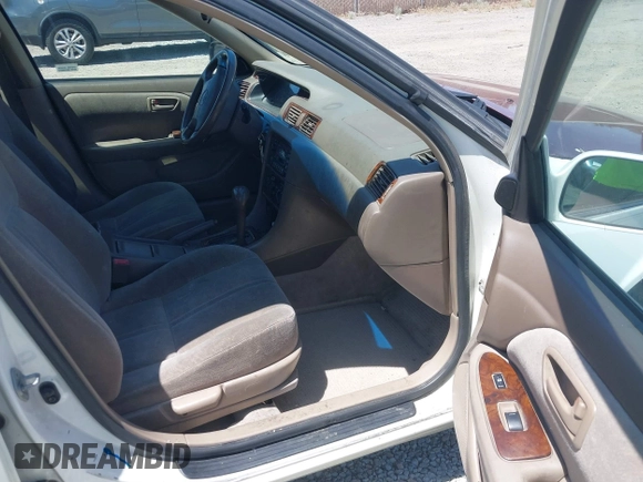 1999 Toyota Camry LE z VIN JT2BG22K3X0342513, wystawiony jako IAAI lot #42371033 z przebiegiem 159 894 mil mil oraz . Historia ofert i sprzedaży dostępna na DreamBid. Obrazek 5.