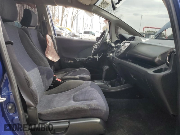 2013 Honda Fit Sport with VIN JHMGE8H56DC068174, listed as a Copart auction lot 50687815 with 106,629 mi miles and Salvage Title. Bid and sale history available at carsss.com. Image 7.