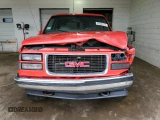 1999 GMC Yukon with VIN 1GKEK13R1XJ711537, listed as a Copart auction lot 51658175 with 228,786 mi miles and Salvage Title. Bid and sale history available at carsss.com. Image 5.