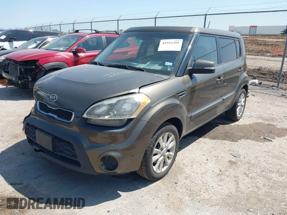 2012 Kia Soul + with VIN KNDJT2A69C7403710, listed as a IAAI auction lot 41916201 with 163,064 mi miles. Bid and sale history available at carsss.com. Image 2.