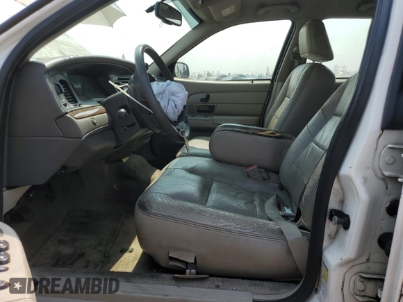 2007 Ford Crown Victoria LX с VIN 2FAFP74V47X119952, выставлен на аукционе Copart как лот 71025704 с пробегом 220 034 миль миль и Списание • Salvage title. История ставок и продаж доступна на DreamBid. Изображение 7.
