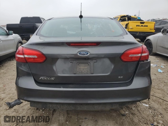 2017 Ford Focus SE с VIN 1FADP3F25HL205076, выставлен на аукционе Copart как лот 43329075 с пробегом 77 165 миль миль и Списание • Salvage title. История ставок и продаж доступна на DreamBid. Изображение 6.