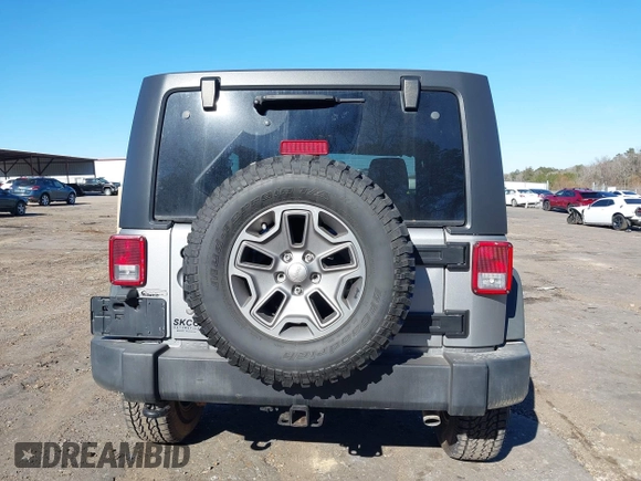 2016 Jeep Wrangler Rubicon z VIN 1C4BJWCGXGL307542, wystawiony jako IAAI lot #41407411 z przebiegiem 124 749 mil mil oraz . Historia ofert i sprzedaży dostępna na DreamBid. Obrazek 16.